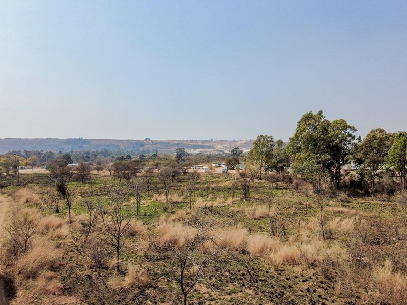 Six hectares level plot adjacent to ahighway and a busy arterial route in a fast-developing area - Photo 4