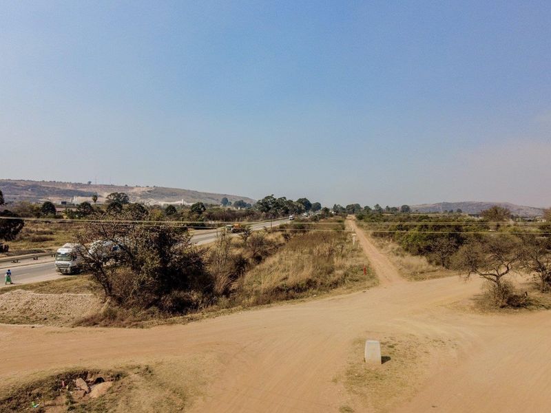 Six hectares level plot adjacent to ahighway and a busy arterial route in a fast-developing area - Photo 3