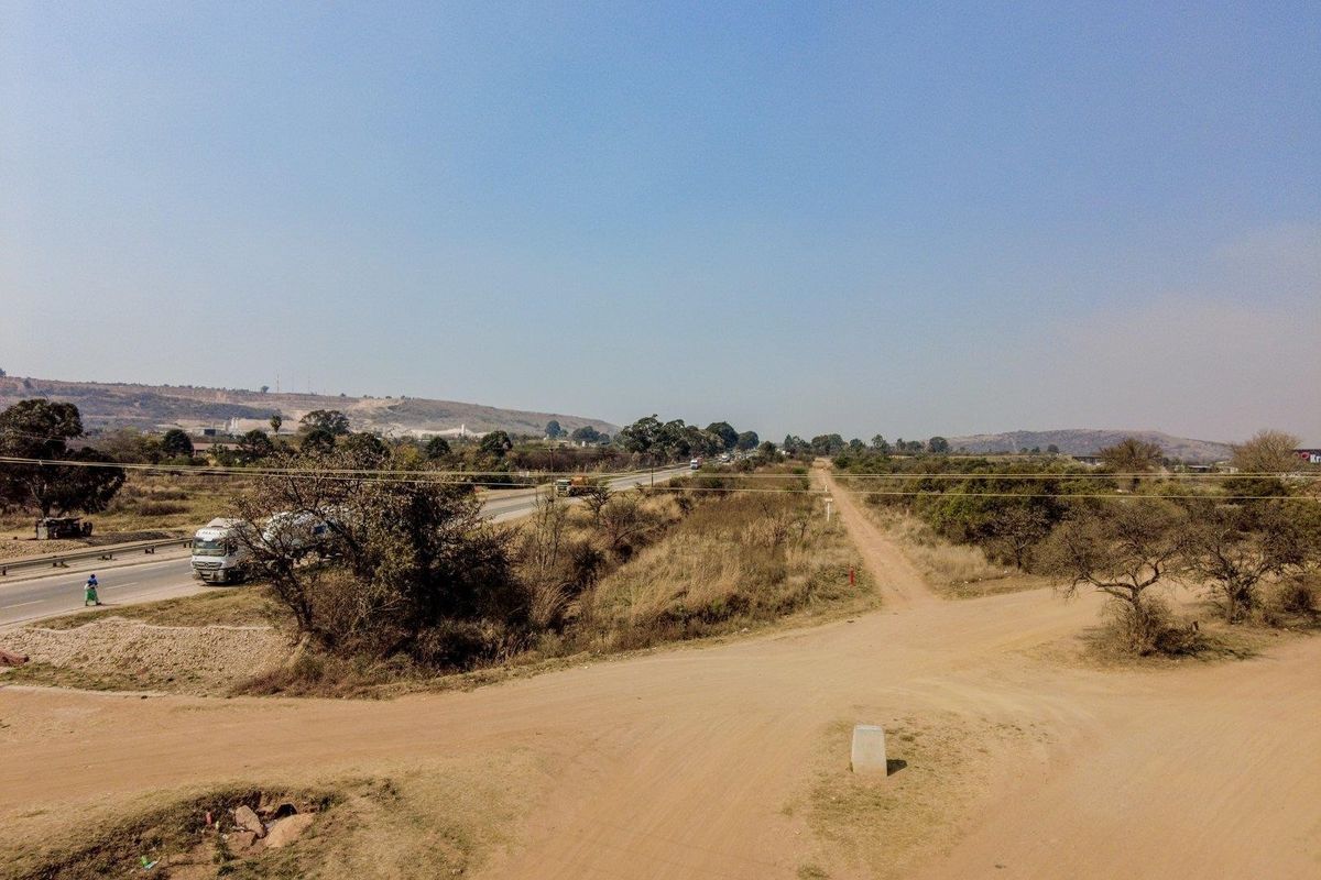 Six hectares level plot adjacent to ahighway and a busy arterial route in a fast-developing area - Photo 3