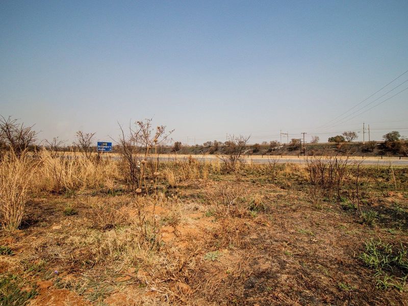 Six hectares level plot adjacent to ahighway and a busy arterial route in a fast-developing area - Photo 8