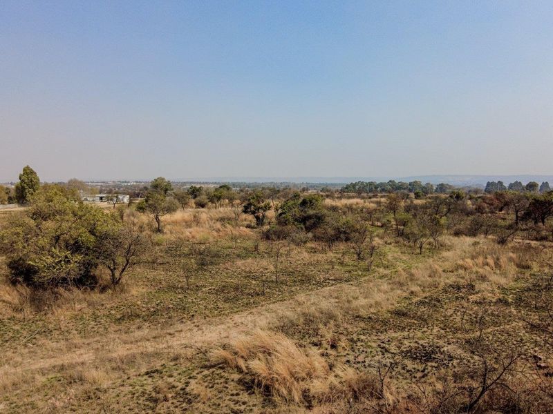 Earmarked for rezoning to a fuel outlet - five hectares level plot on corner of highway - Photo 7