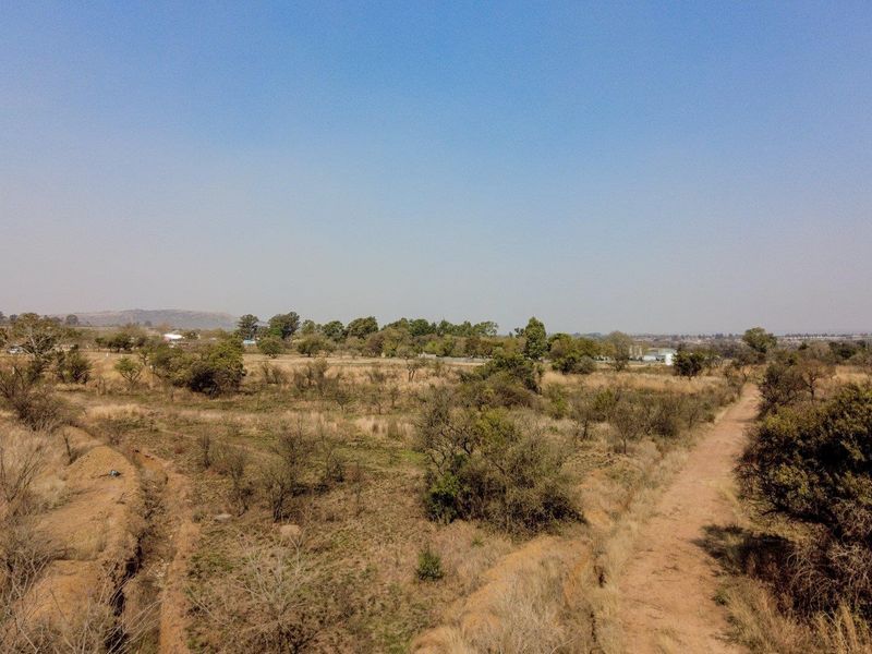 Earmarked for rezoning to a fuel outlet - five hectares level plot on corner of highway - Photo 9