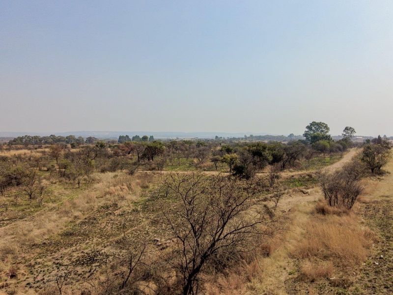 Earmarked for rezoning to a fuel outlet - five hectares level plot on corner of highway - Photo 8