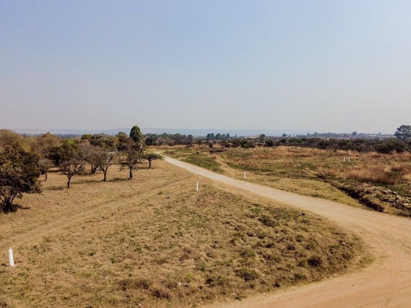 Five hectares level plot on corner of highway and a busy arterial route in a fast-developing area - Photo 1
