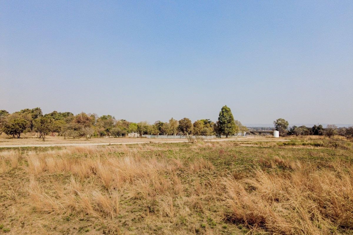 Five hectares level plot on corner of highway and a busy arterial route in a fast-developing area - Photo 3