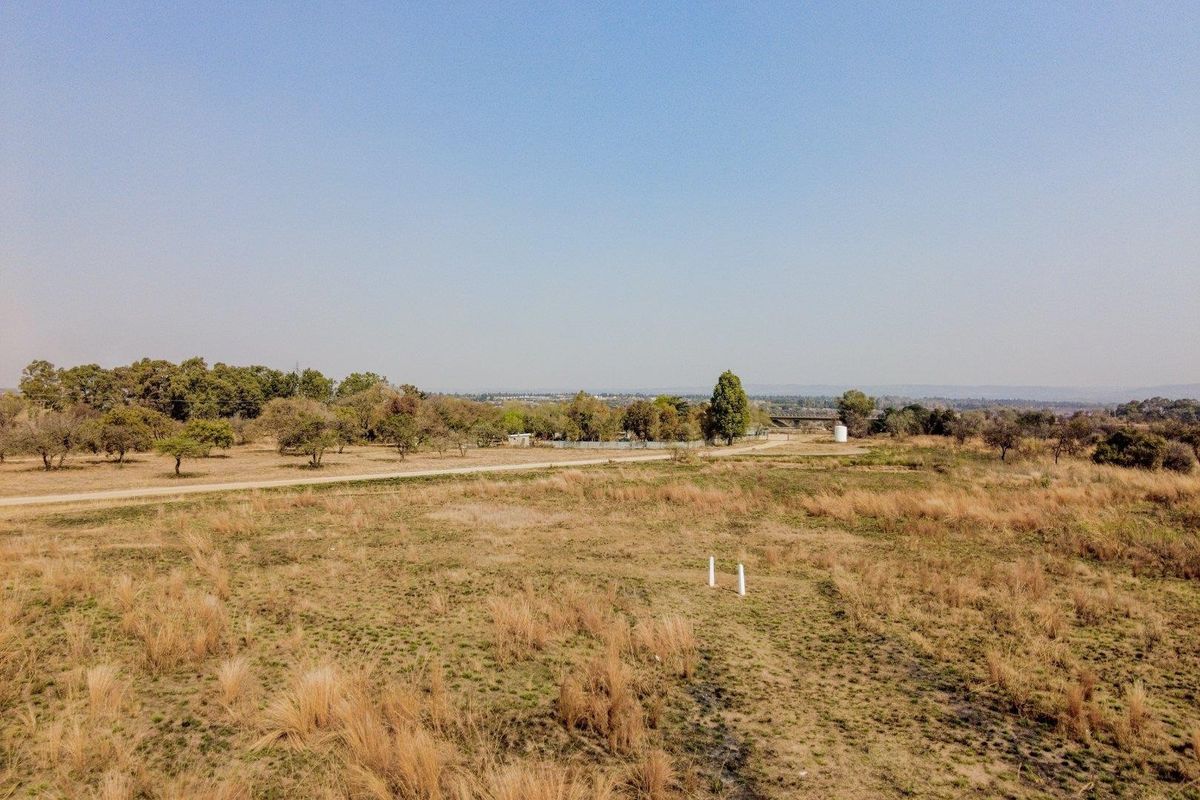 Five hectares level plot on corner of highway and a busy arterial route in a fast-developing area - Photo 2