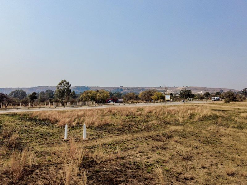 Five hectares level plot on corner of highway and a busy arterial route in a fast-developing area - Photo 5