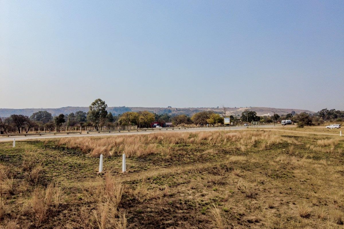 Five hectares level plot on corner of highway and a busy arterial route in a fast-developing area - Photo 5