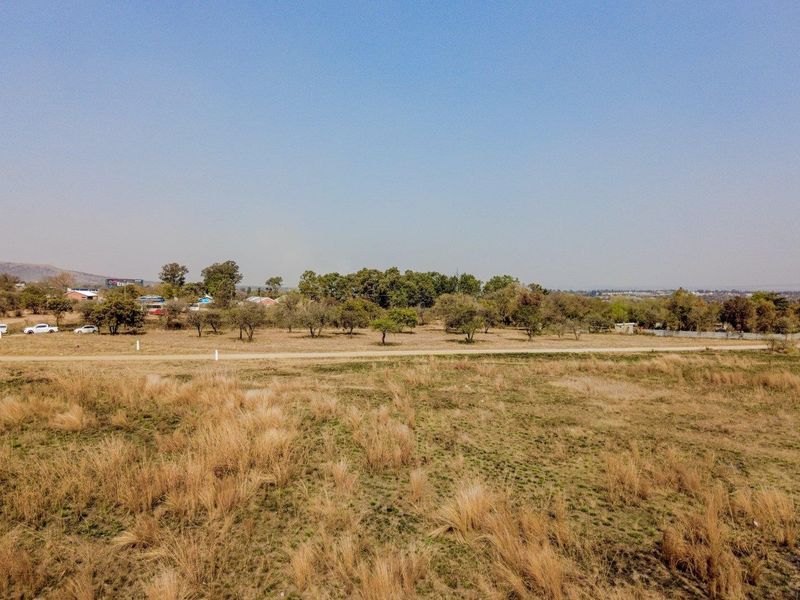 Five hectares level plot on corner of highway and a busy arterial route in a fast-developing area - Photo 4