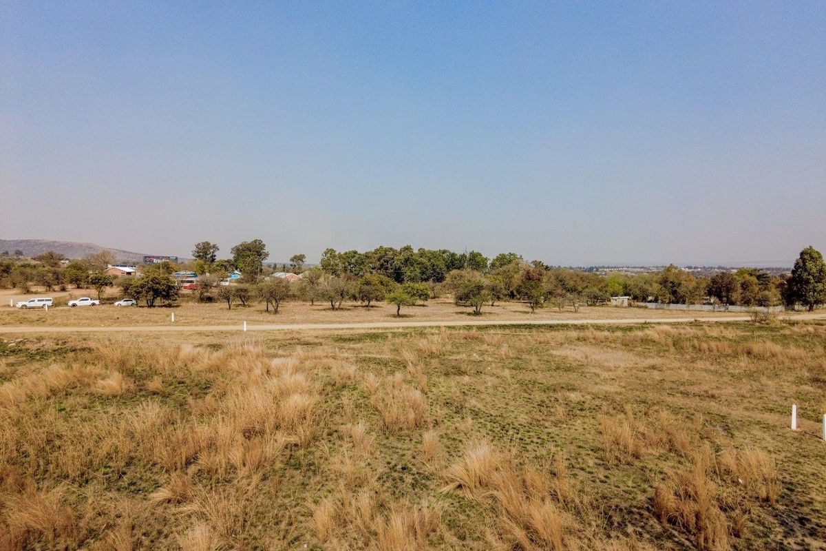 Five hectares level plot on corner of highway and a busy arterial route in a fast-developing area - Photo 4