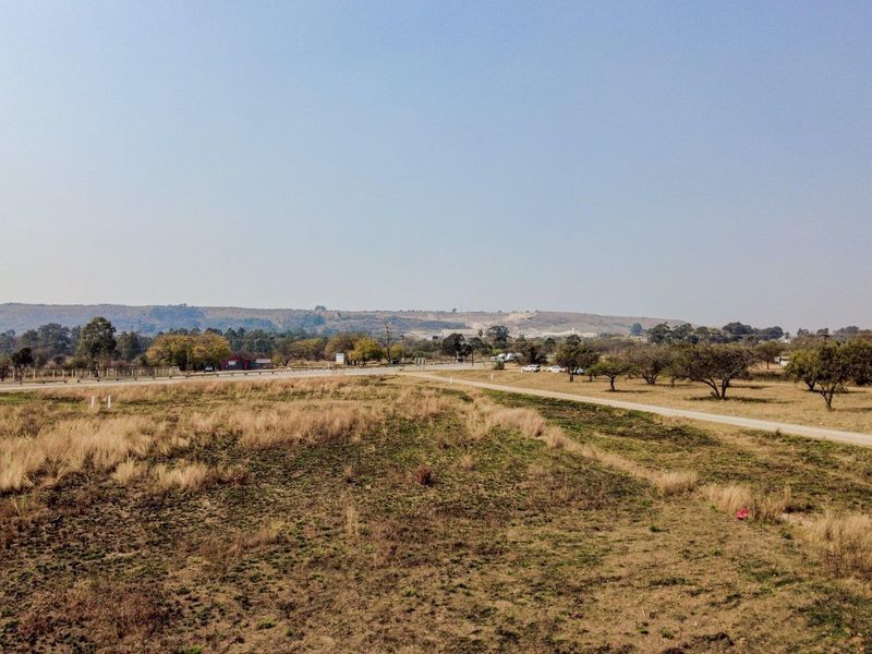Five hectares level plot on corner of highway and a busy arterial route in a fast-developing area - Photo 9