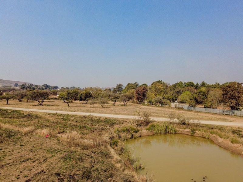 Five hectares level plot on corner of highway and a busy arterial route in a fast-developing area - Photo 8