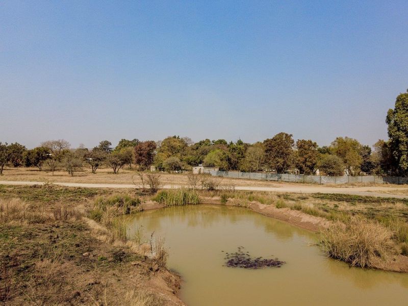 Five hectares level plot on corner of highway and a busy arterial route in a fast-developing area - Photo 7