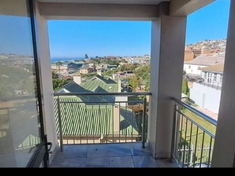 Spacious Coastal Living with Sea View Apartment - Photo 2