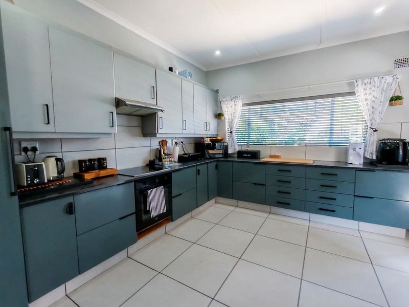 Exceptional Family Home with Pool, Entertainment Areas and Modern Comforts in Nelspruit Ext 5 - Photo 10