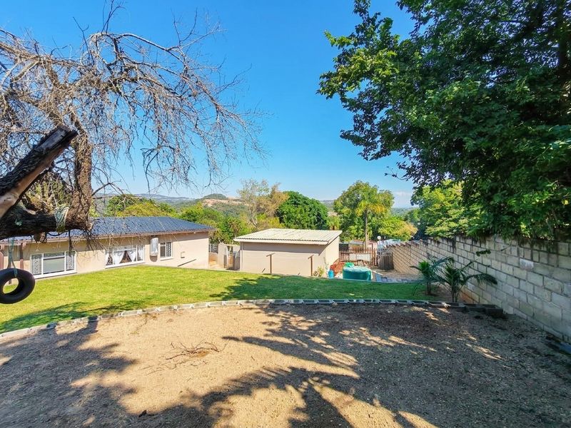 Exceptional Family Home with Pool, Entertainment Areas and Modern Comforts in Nelspruit Ext 5 - Photo 9
