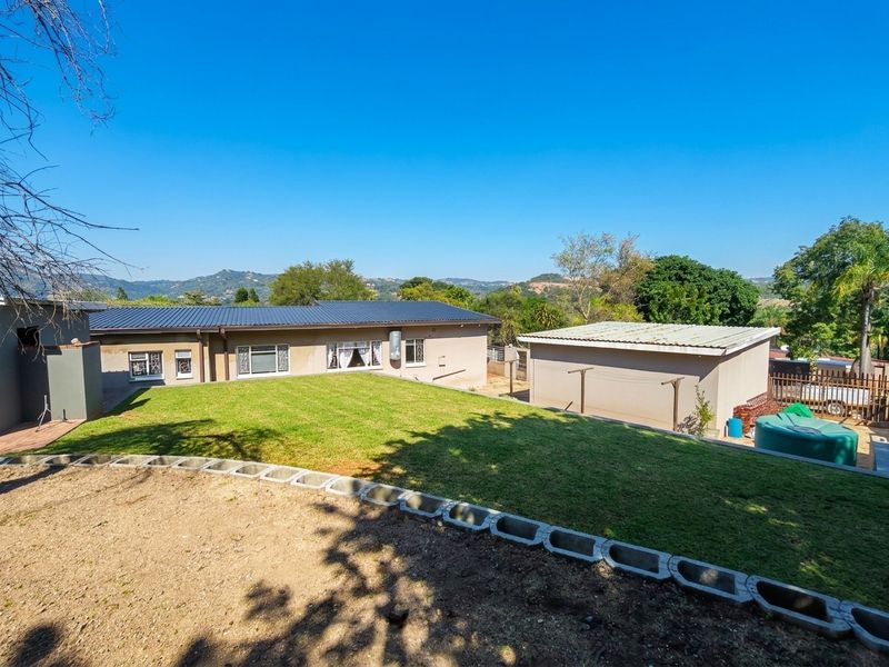 Exceptional Family Home with Pool, Entertainment Areas and Modern Comforts in Nelspruit Ext 5 - Photo 5