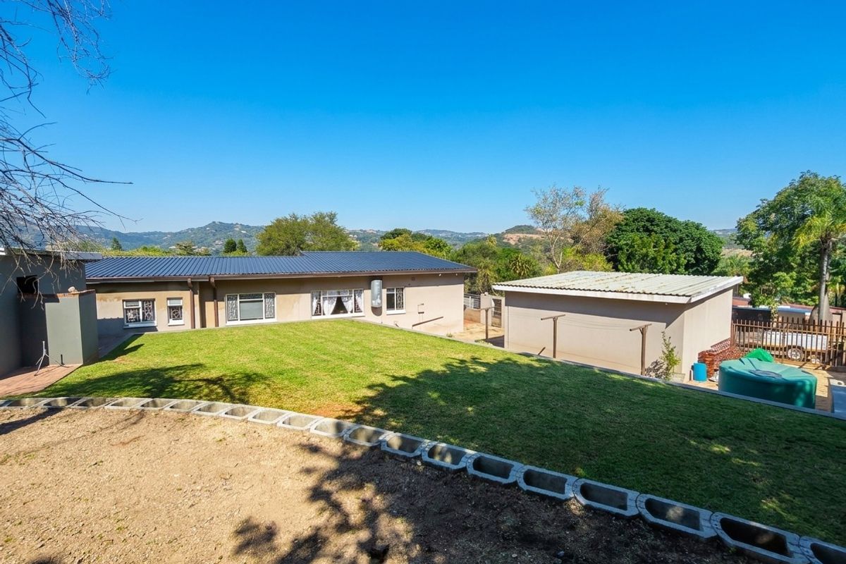 Exceptional Family Home with Pool, Entertainment Areas and Modern Comforts in Nelspruit Ext 5 - Photo 5