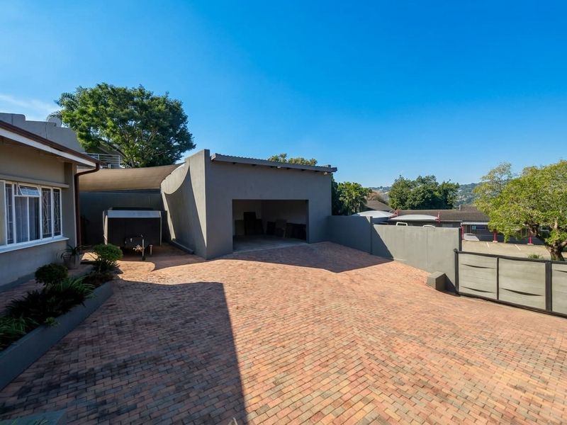 Exceptional Family Home with Pool, Entertainment Areas and Modern Comforts in Nelspruit Ext 5 - Photo 4