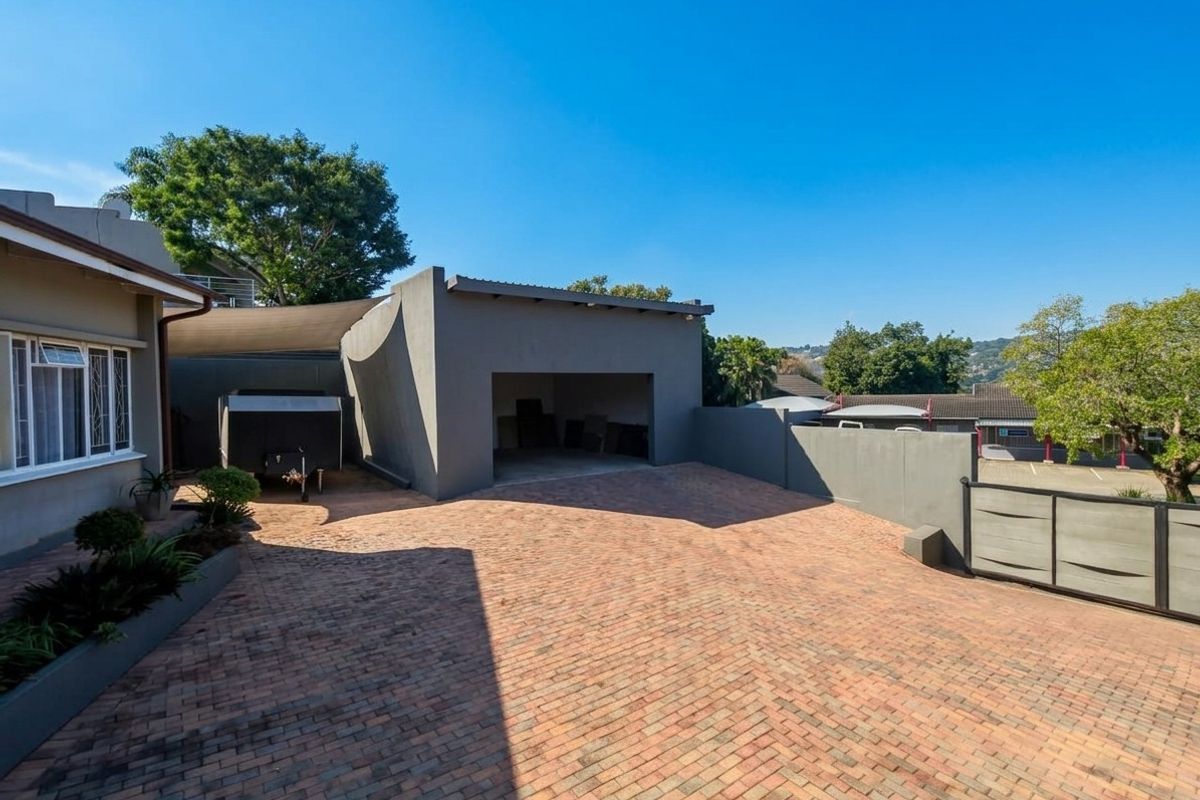 Exceptional Family Home with Pool, Entertainment Areas and Modern Comforts in Nelspruit Ext 5 - Photo 4