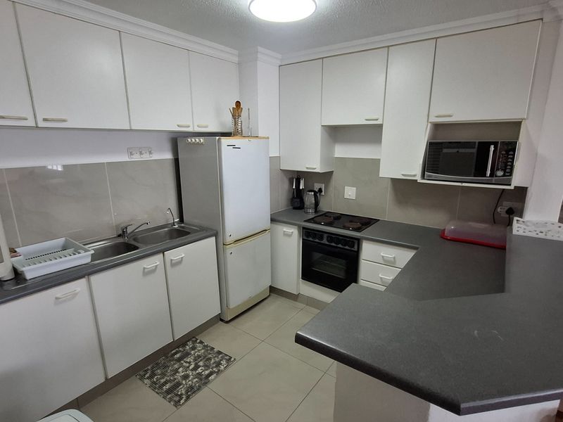 UVONGO STUNNING FULLY FURNISHED BEACHFRONT APARTMENT WITH AMAZING SEAVIEWS FOR SALE , UVONGO BEACH - Photo 7