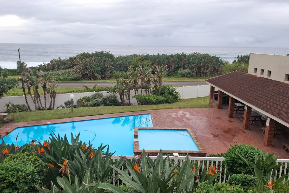 UVONGO STUNNING FULLY FURNISHED BEACHFRONT APARTMENT WITH AMAZING SEAVIEWS FOR SALE , UVONGO BEACH - Photo 2