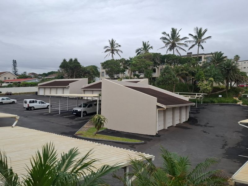 UVONGO STUNNING FULLY FURNISHED BEACHFRONT APARTMENT WITH AMAZING SEAVIEWS FOR SALE , UVONGO BEACH - Photo 5