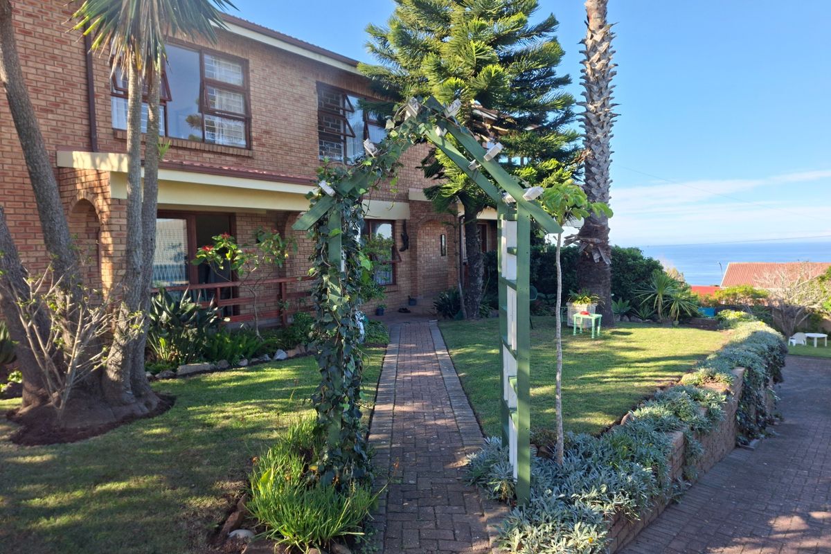 Multi-Level Coastal Residence with Panoramic Ocean Views and Endless Potential - Photo 2