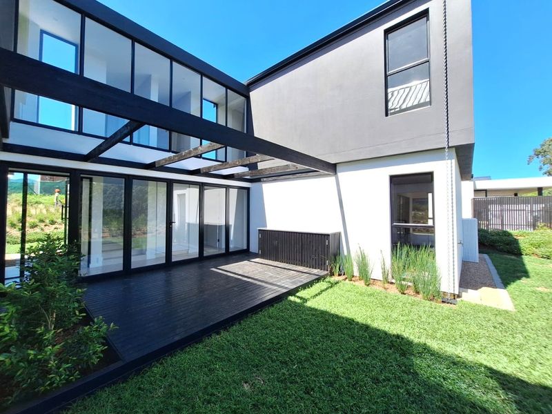 4 Bed 4.5 Bath Contemporary Sustainable Home  in Elaleni Coastal Forest Estate - Photo 2