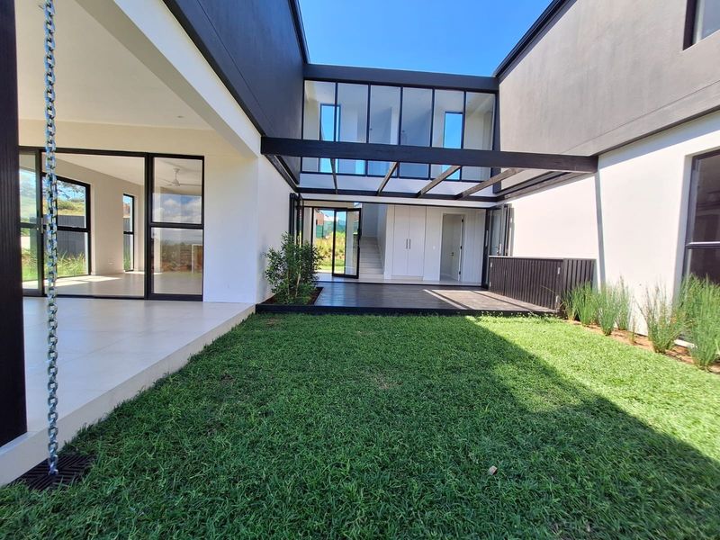 4 Bed 4.5 Bath Contemporary Sustainable Home  in Elaleni Coastal Forest Estate - Photo 3