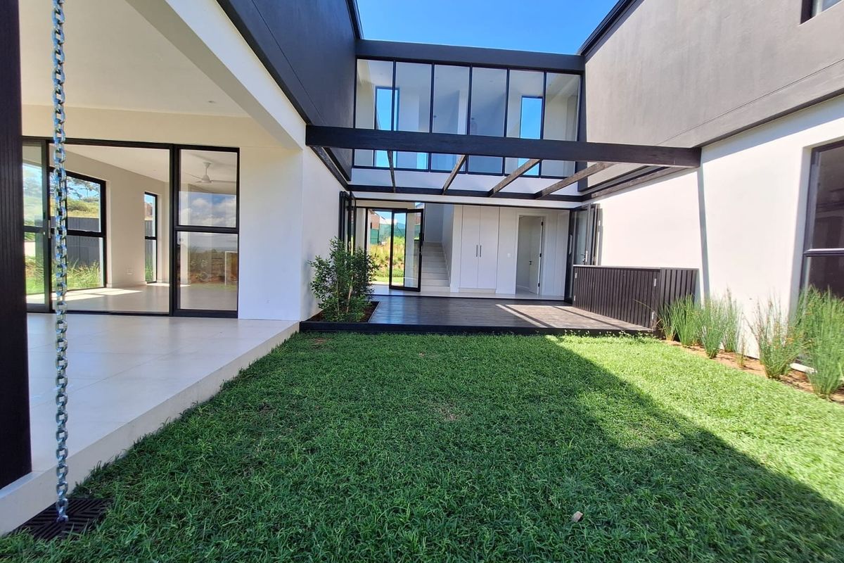 4 Bed 4.5 Bath Contemporary Sustainable Home  in Elaleni Coastal Forest Estate - Photo 3