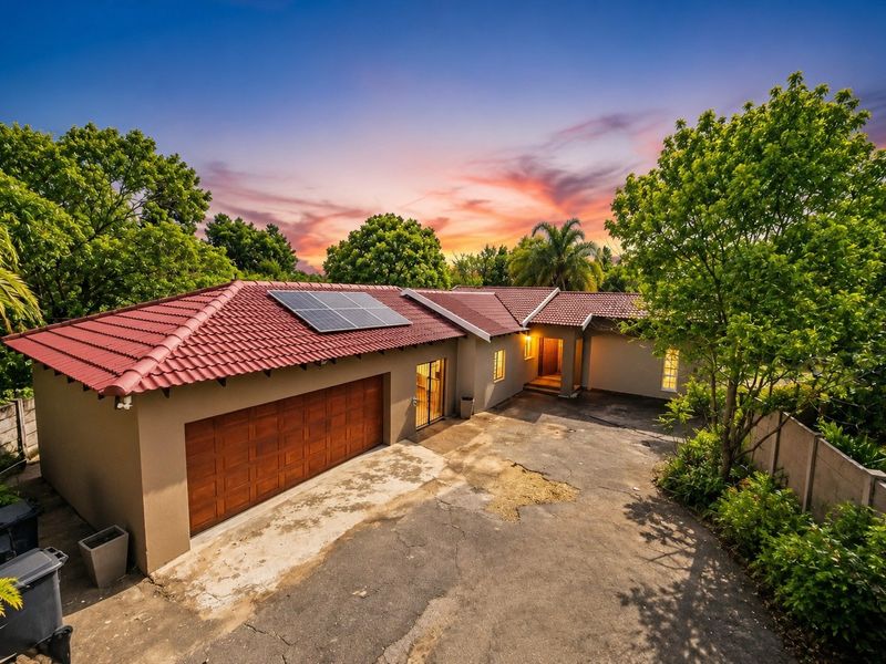 Elegant Family Living on a Spacious Stand in Prime Douglasdale - Photo 1