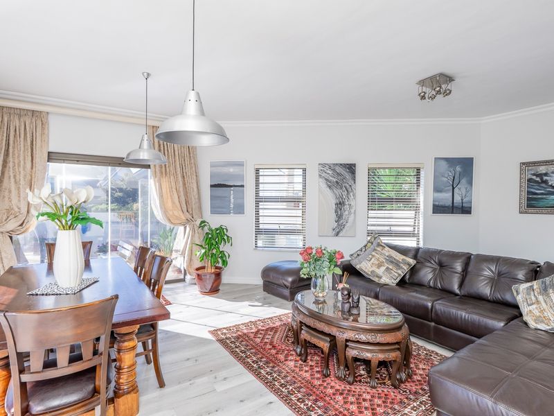 4-Bed Architectural Masterpiece with Panoramic Views in Graanendal Estate - Photo 4