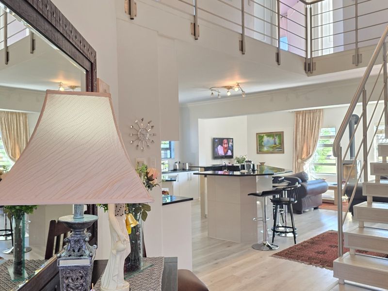 4-Bed Architectural Masterpiece with Panoramic Views in Graanendal Estate - Photo 9