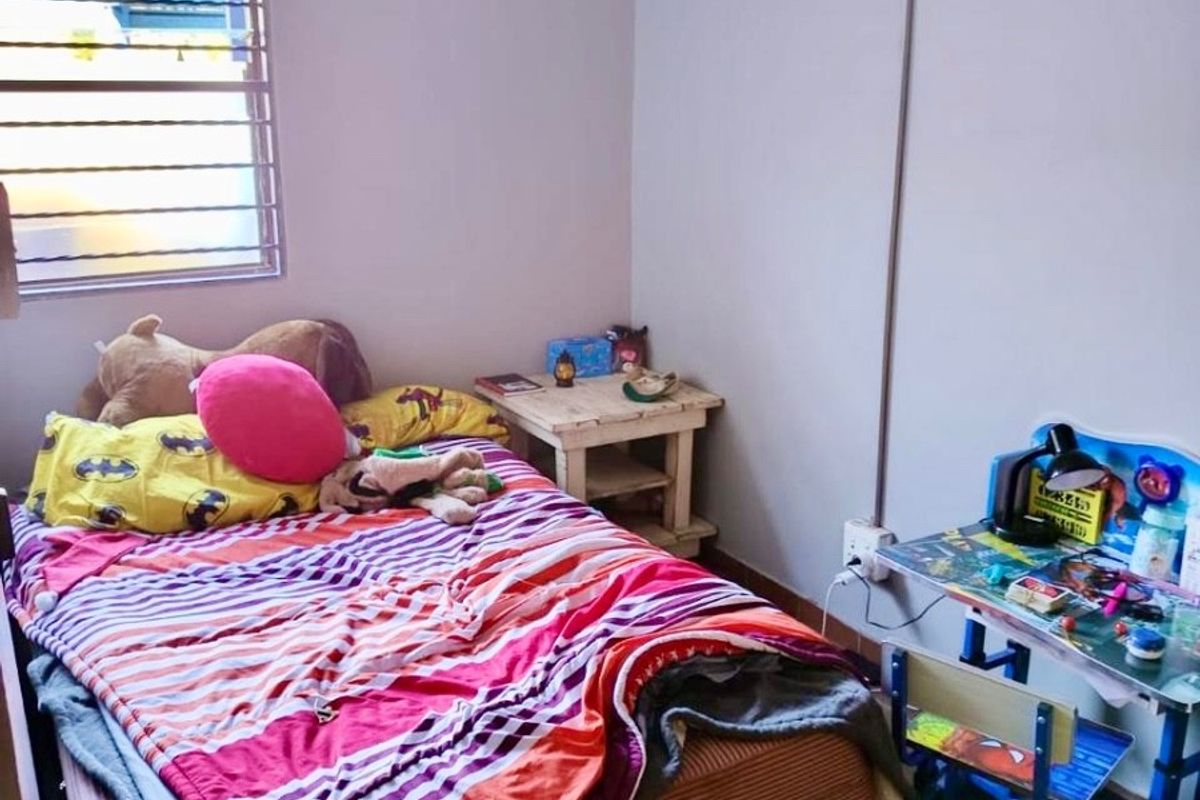 A bedroom featuring tiled flooring, a window with security bars, and surface-mounted electrical conduit.