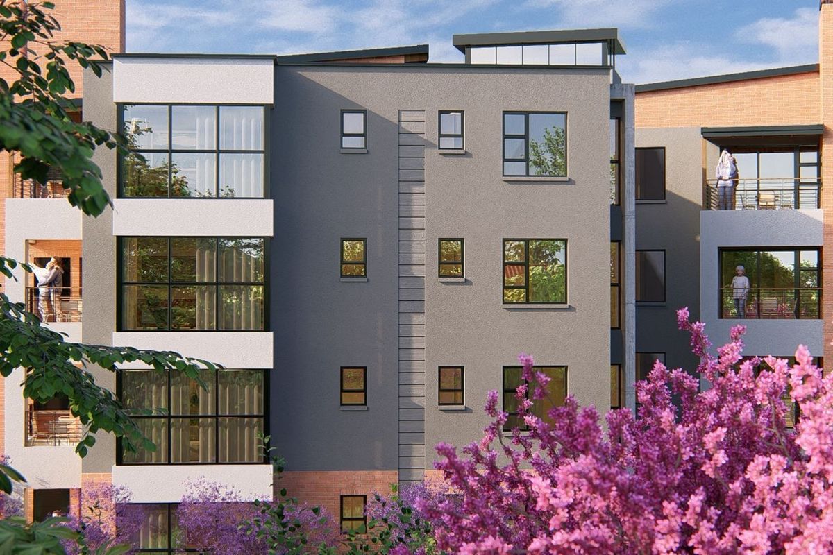 A modern multi-story apartment building facade featuring contemporary grey and brick finishes, large windows, and private balconies.