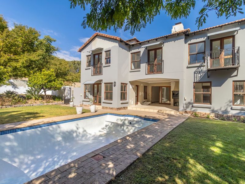Pristine Family Living in Royal Kyalami Country Estate | 4 Bedrooms | 3.5 Bathrooms | Sparkling Pool - Photo 4
