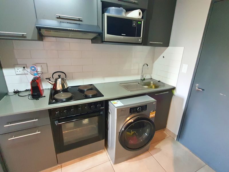 Modern Apartment with Patio in Sought After Complex - Photo 6