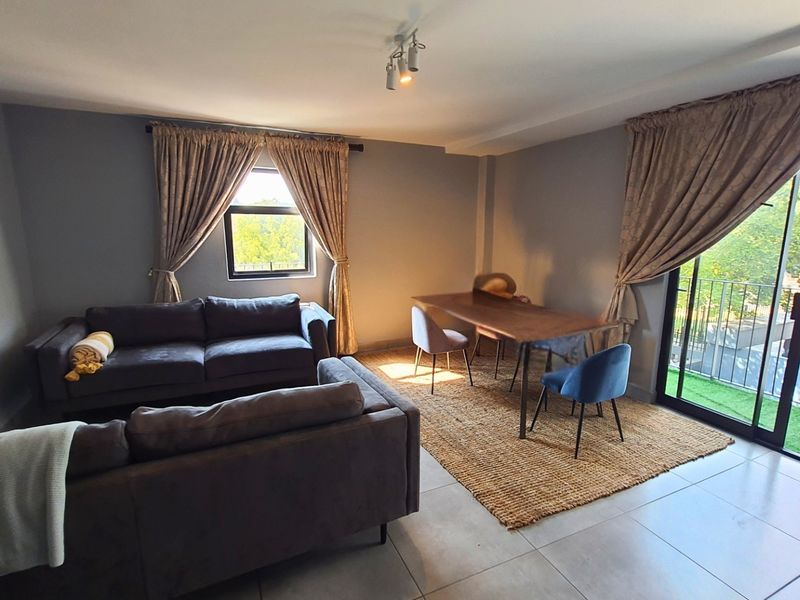 Modern Apartment with Patio in Sought After Complex - Photo 1