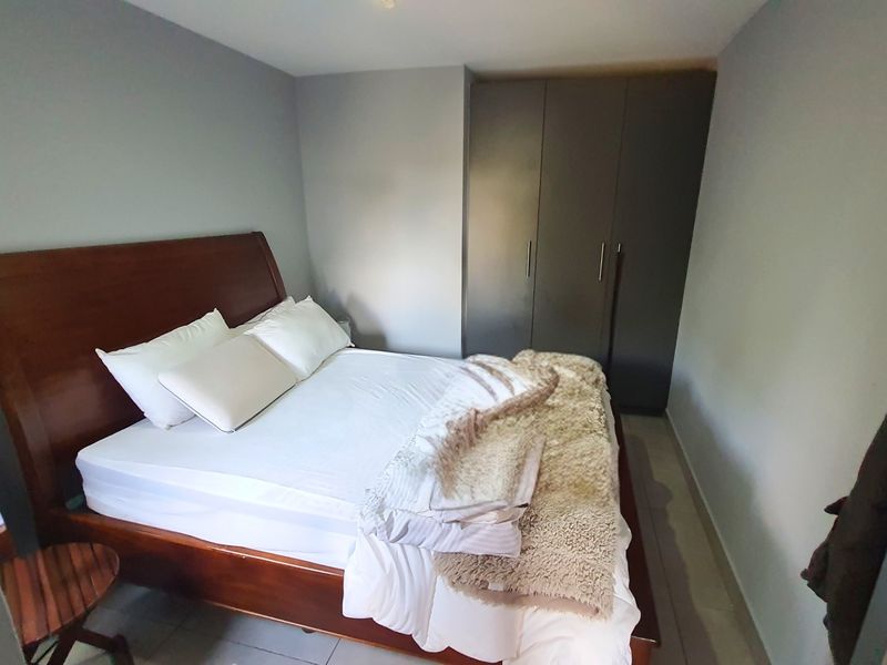 Modern Apartment with Patio in Sought After Complex - Photo 4