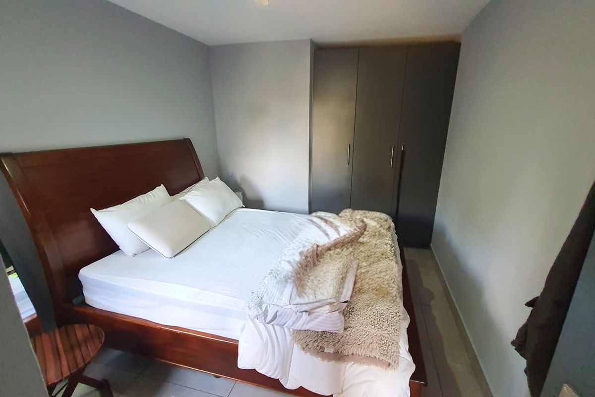 Modern Apartment with Patio in Sought After Complex - Photo 4