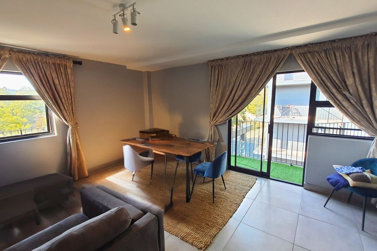 Modern Apartment with Patio in Sought After Complex - Photo 2