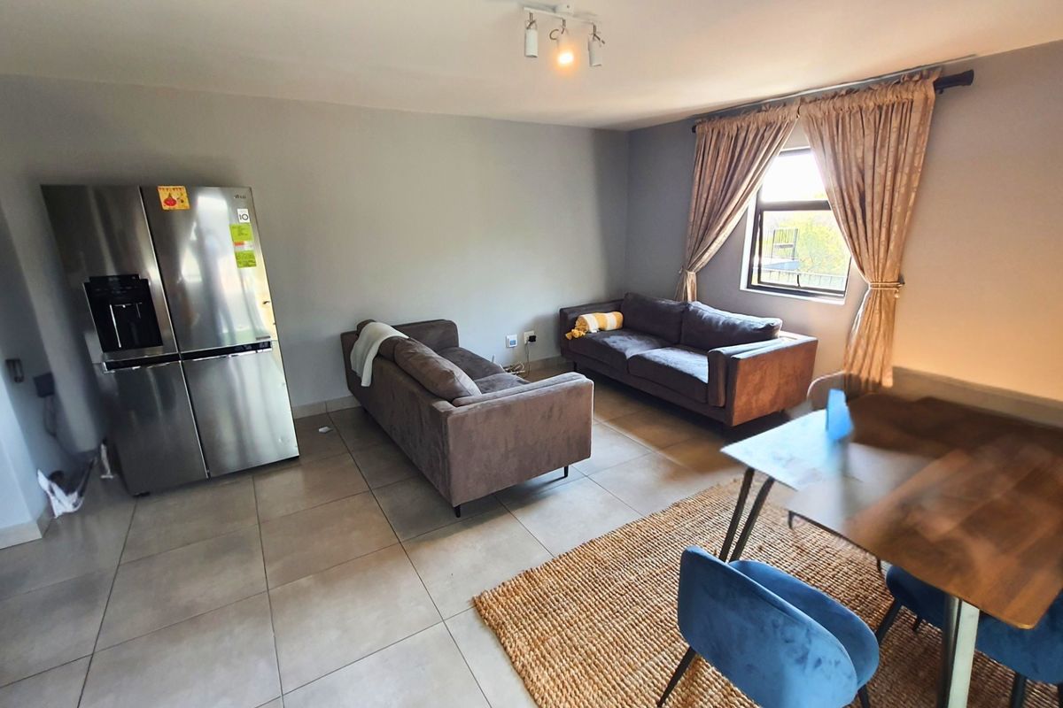 Modern Apartment with Patio in Sought After Complex - Photo 3
