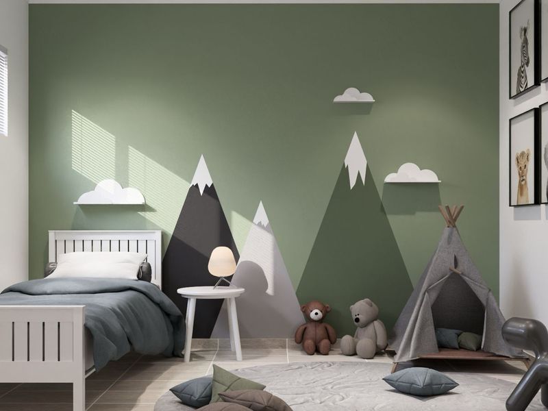 A well-maintained bedroom featuring a decorative mountain-themed accent wall, tiled flooring, and a window with fitted blinds.