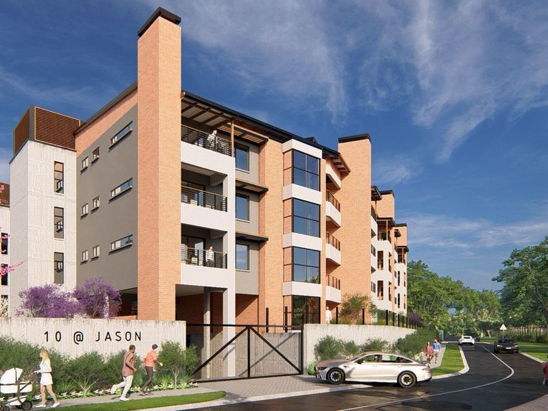 A modern multi-story apartment complex featuring brick and concrete facade elements, balconies, and secure gated entrance.