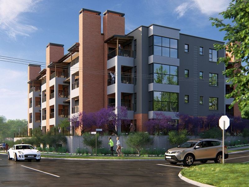 A modern multi-story apartment building featuring brick and grey facade elements with integrated balconies and large windows, situated on a corner street lot.
