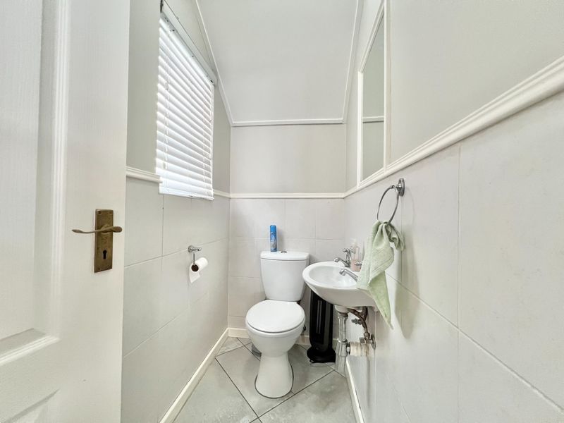 Elegant Freestanding Duplex with Garage and Pet-Friendly Garden - Photo 10