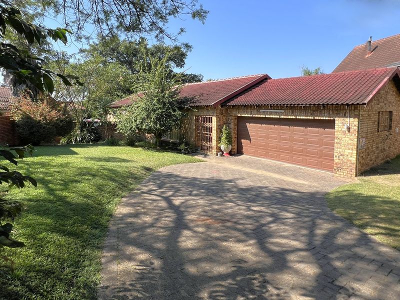 Spacious Family Home on a large Stand in Popular Ext 11 - Photo 1