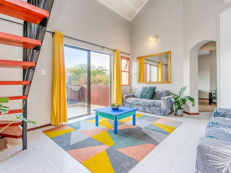 Bright and Spacious Loft Apartment in Bromhof with Massive Entertainment Patio and Stunning Views - Photo 1