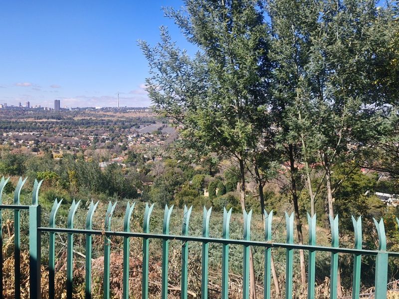 Grand Northcliff Family Home with Breathtaking Views and Unlimited Potential - Photo 10